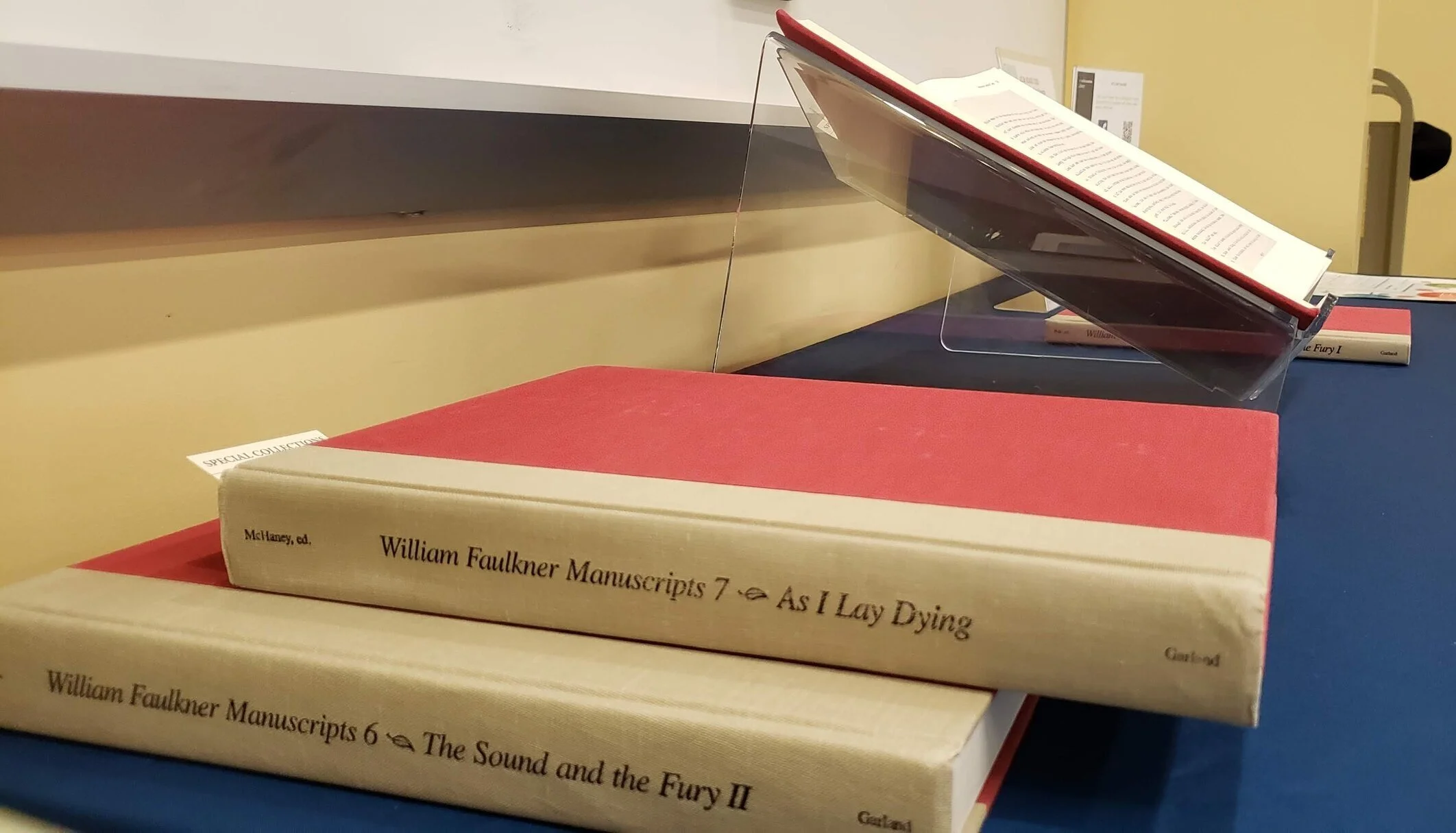  A few of the recently acquired Faulkner manuscript facsimiles on display at the UCSB library. 