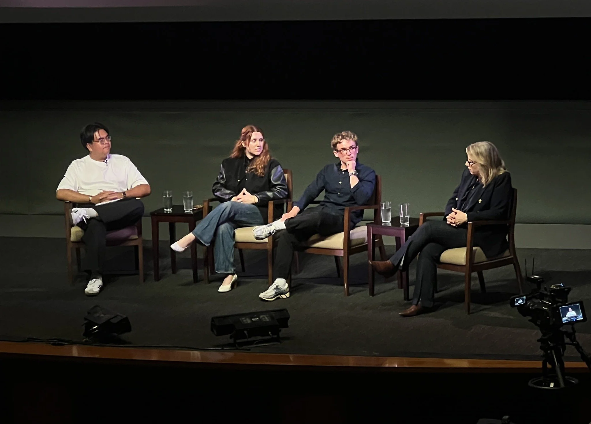   Miguel Penabella, left, a UCSB Film and Media Studies graduate student, moderates a discussion with filmmaker Lauren Greenfield, far right, after a recent screening of her docuseries “Social Studies” by UCSB’s Carsey-Wolf Center. Between them are two former high school students featured in the series: Ivy D’Ambrosia and Jonathan Gelfond.  