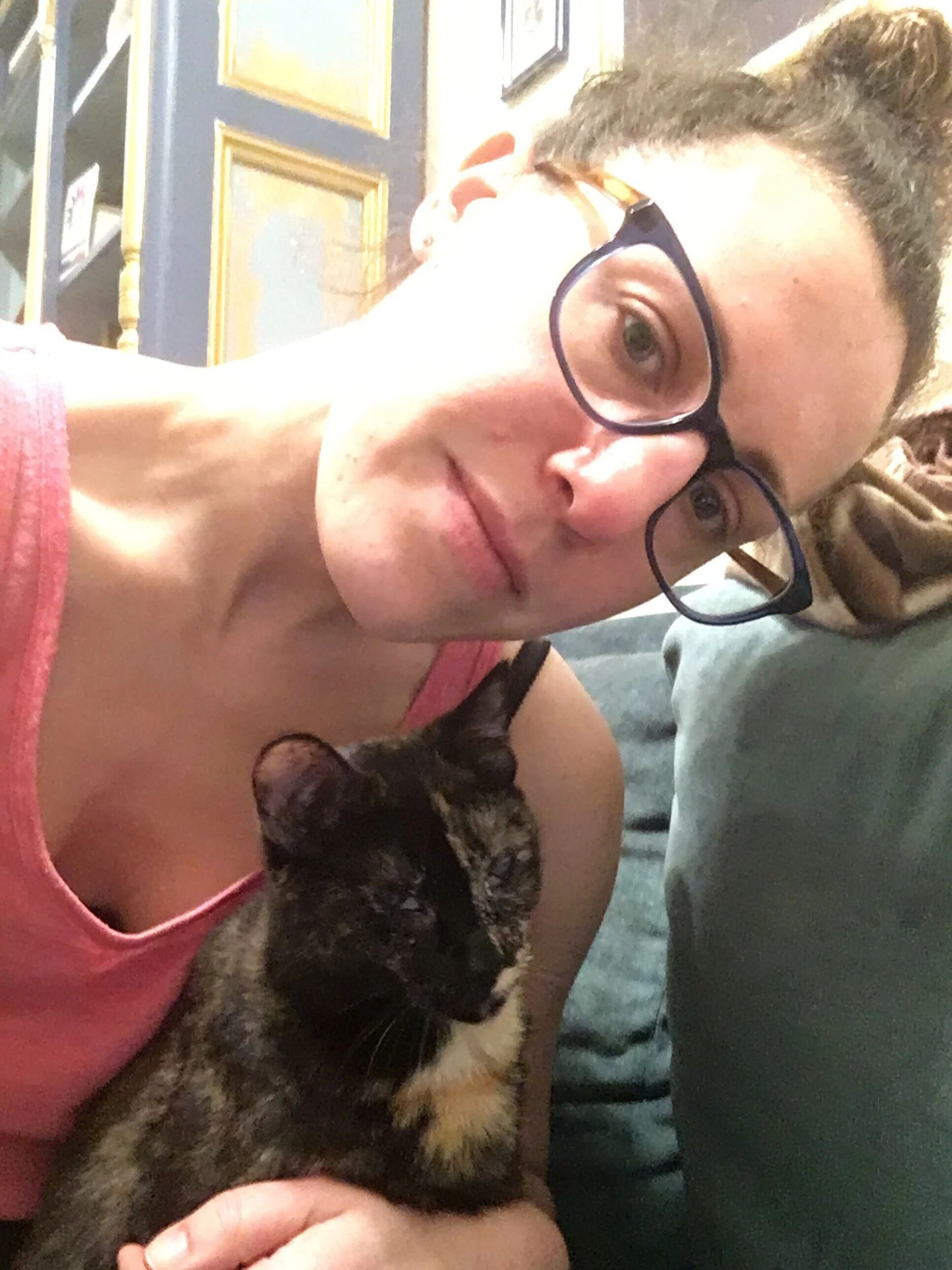  UC Santa Barbara alumna Alex Hoffman (‘08) and one of her foster cats during the current stay-at-home order. Photo by Alex Hoffman. 