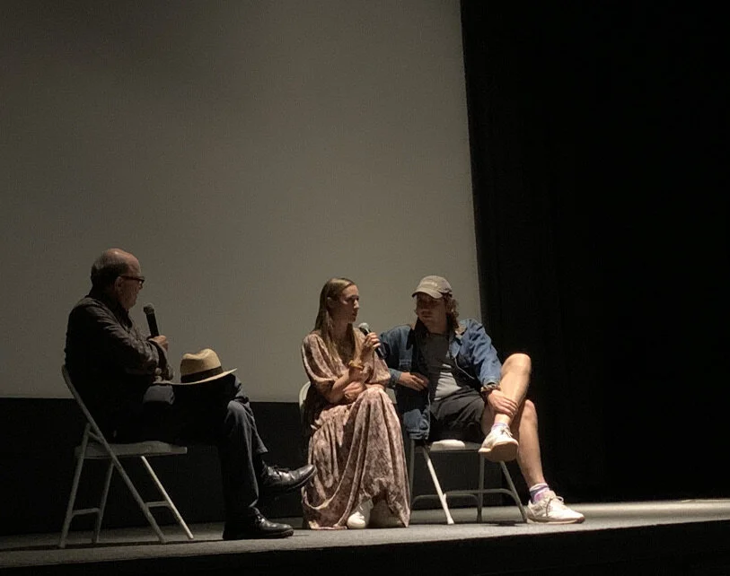   Save Yourselves!  co-writers and co-directors Eleanor Wallace, center, and  Alex Huston Fischer, right,  discuss their moviemaking experience after a screening at Isla Vista Theater. 