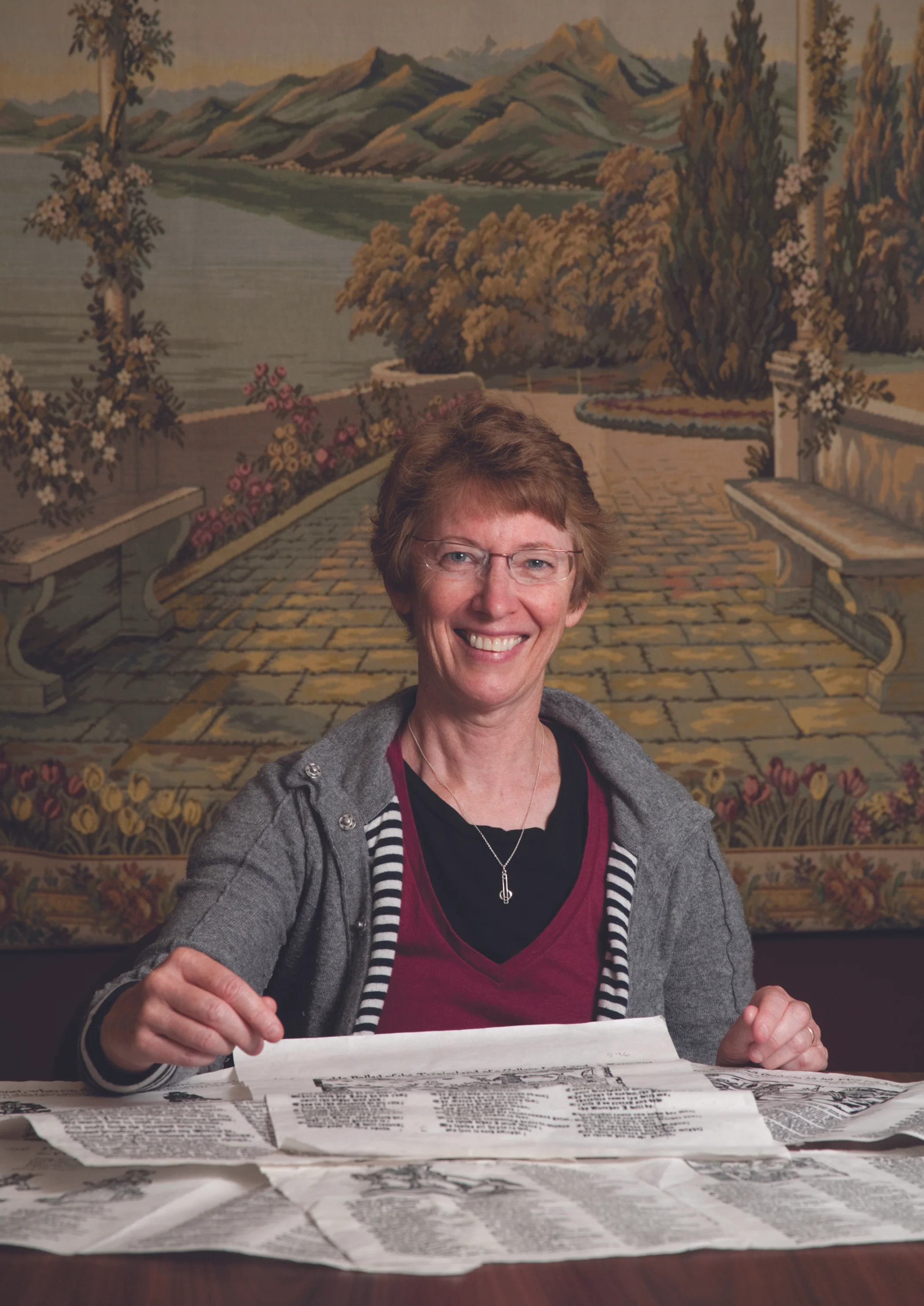  English Professor Patricia Fumerton is pictured with early broadside ballads. 