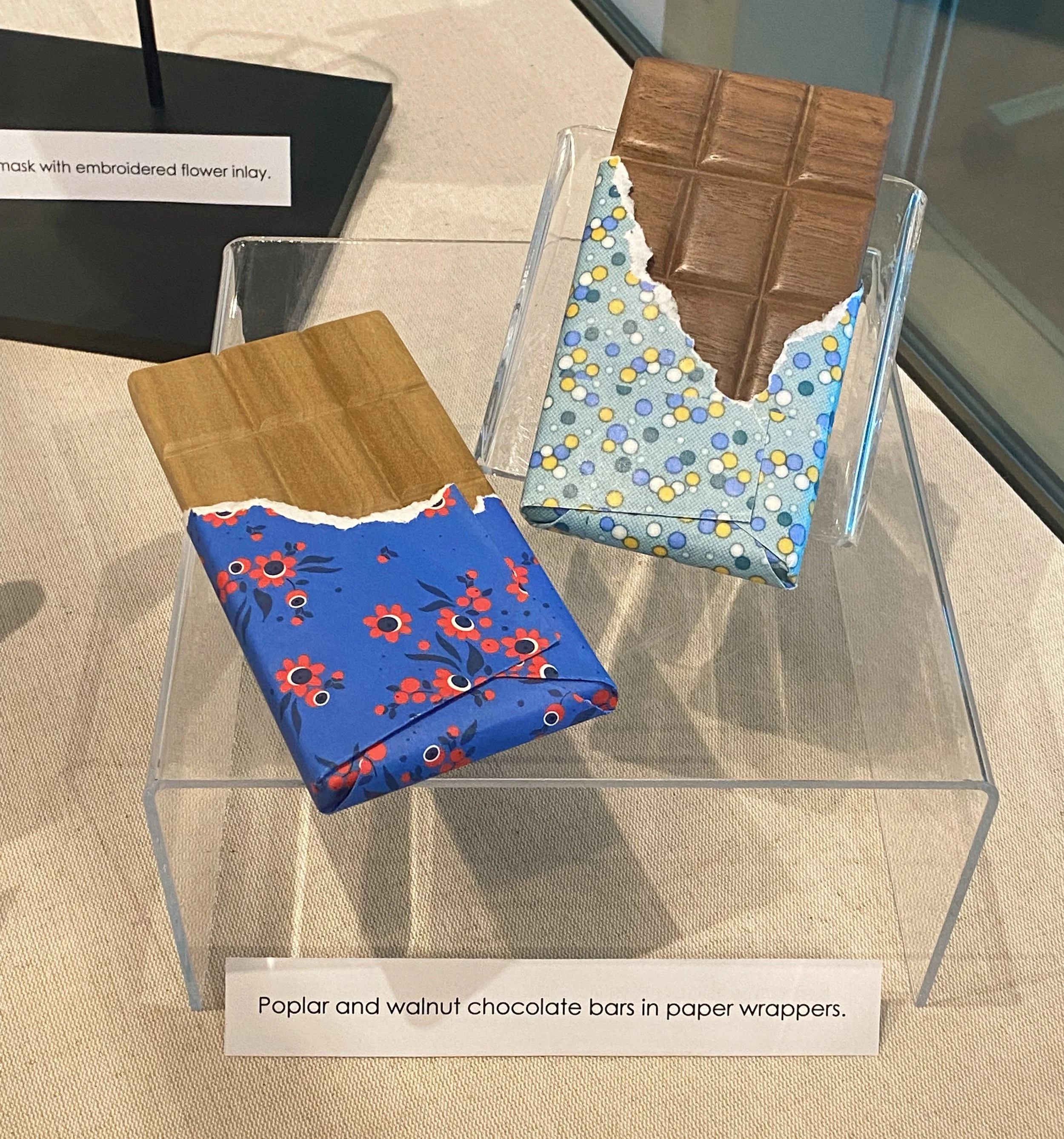  Local artist Elisa Ortega Montilla submitted a collection of objects made out of wood, such as chocolate bars, presenting undervalued objects that became meaningful to her during the pandemic.  