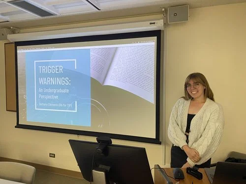  UCSB undergraduate student Bethany Clements starts her presentation on trigger warnings for the English department’s Literature and Mind Research Center.  
