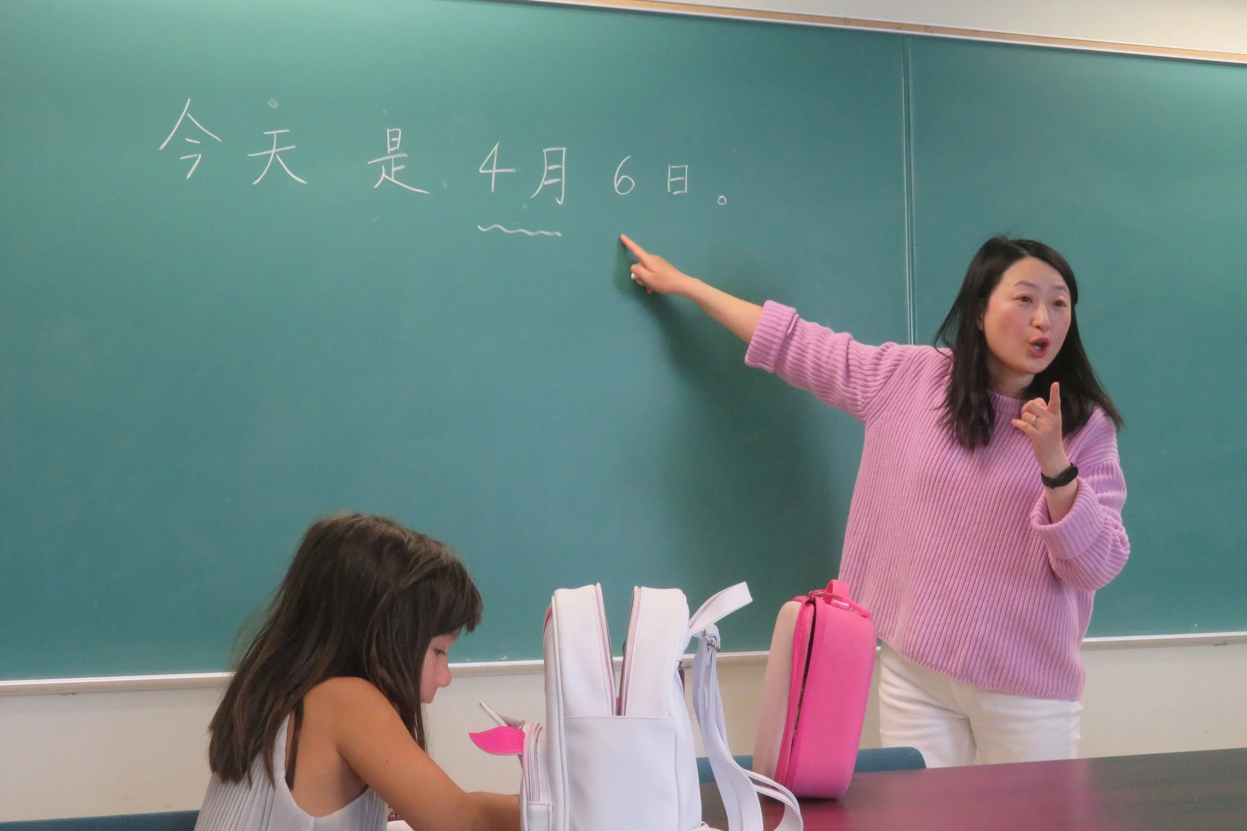   Teacher Jie Zhang 张老师 leading one of the Chinese school’s Sunday classes.  