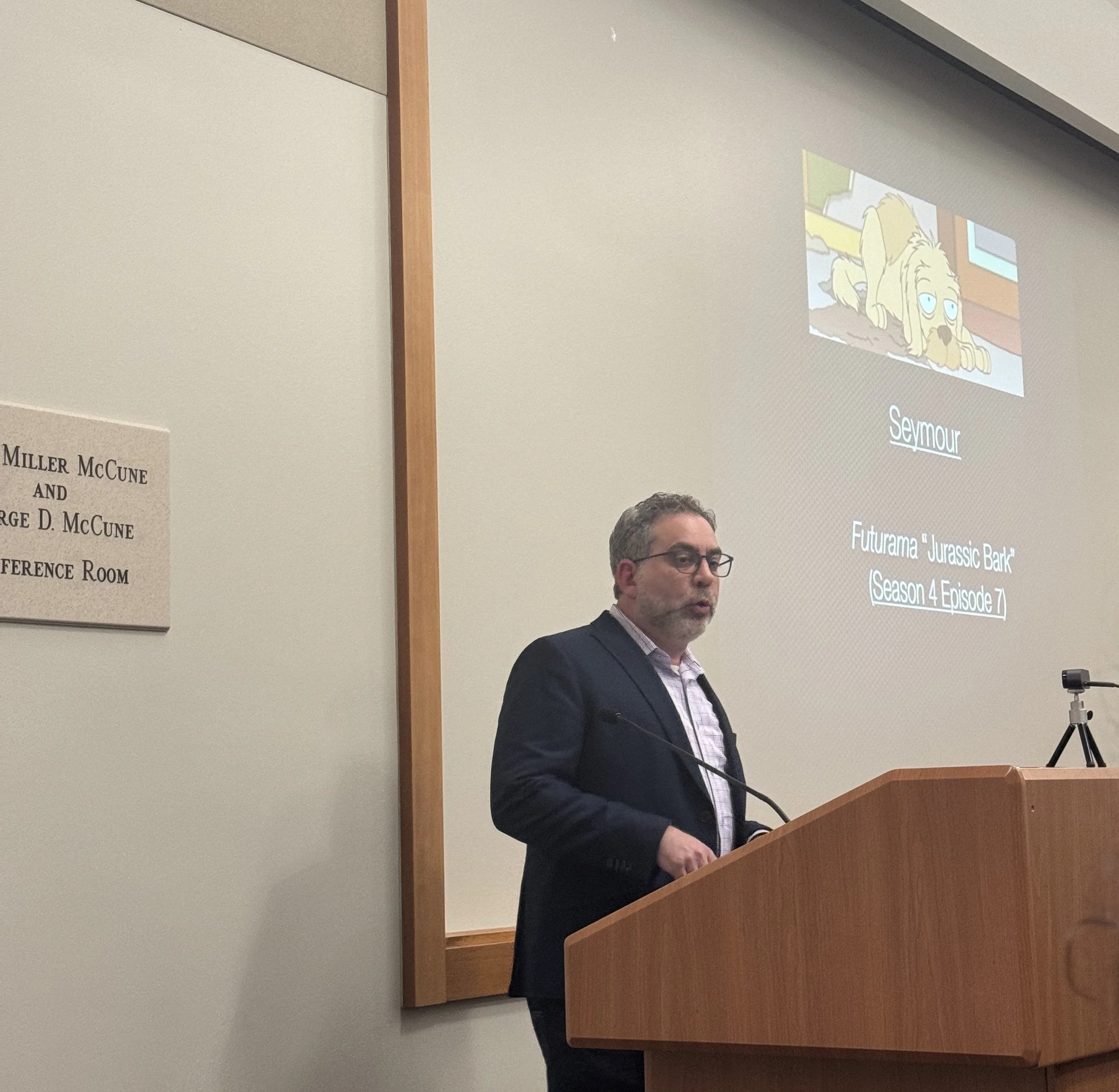   Brett M. Rogers, Classics scholar at the University of Puget Sound, connected concepts of Homer’s epic poem  The Odyssey  to the emerging technology of Artificial Intelligence at a recent talk.  