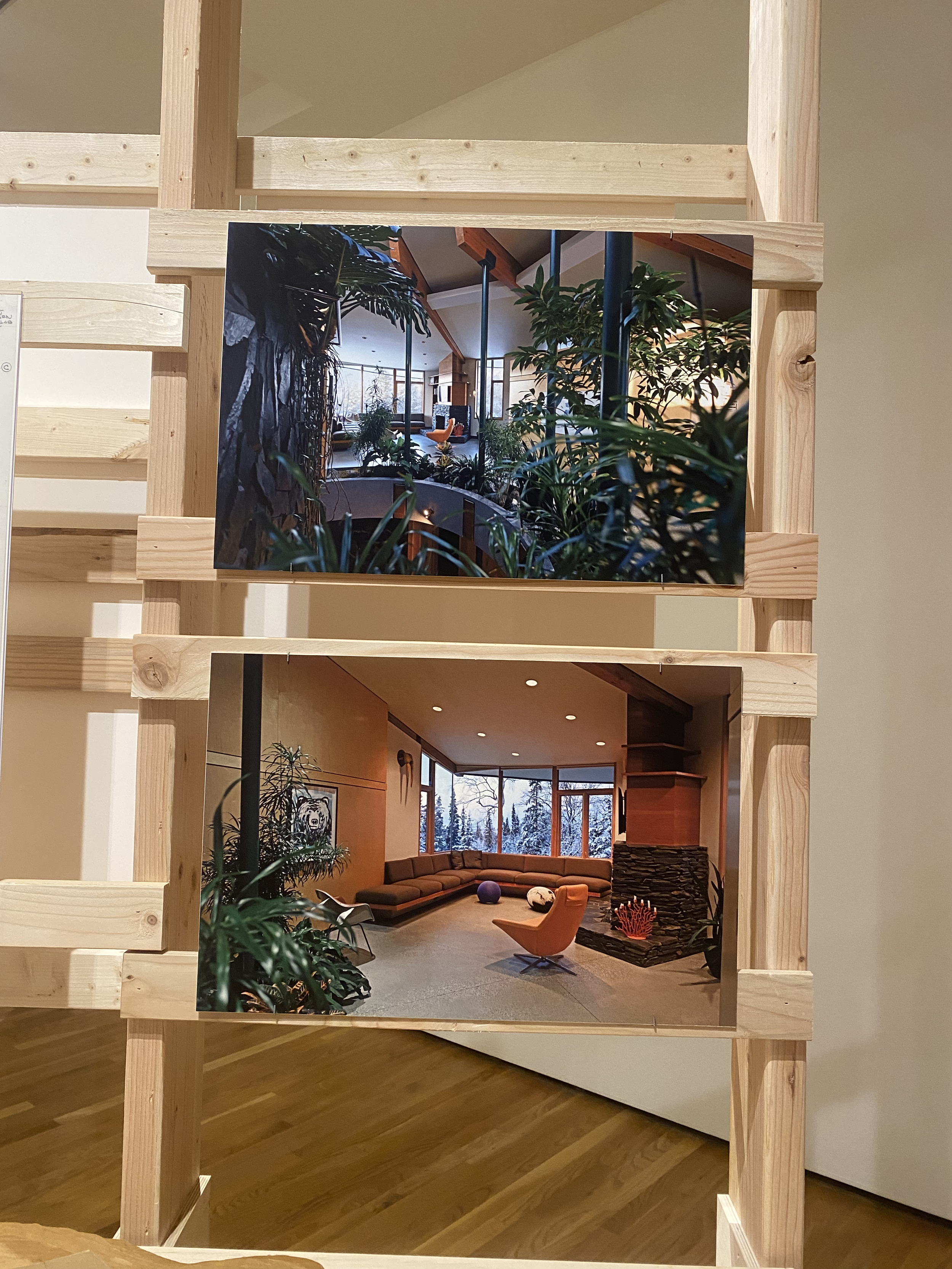  Photos of the interior decor of homes in Los Angeles that were designed by Helena Arahuete, displayed on wooden frames. 