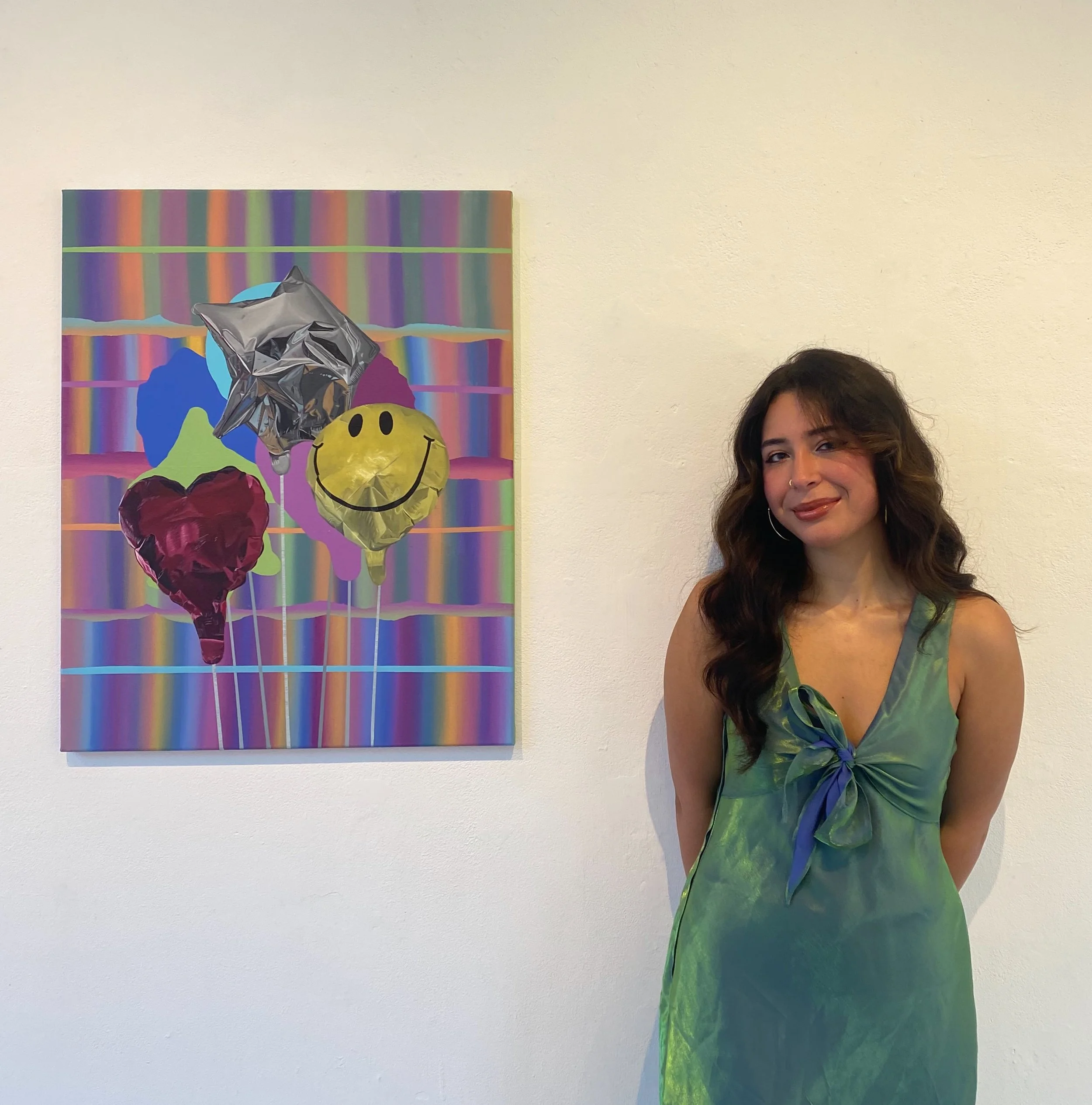  Last week, Anna Sophia Monzon exhibited her new art series “Up, Up, and Away” at the Glass Box Gallery on campus.  