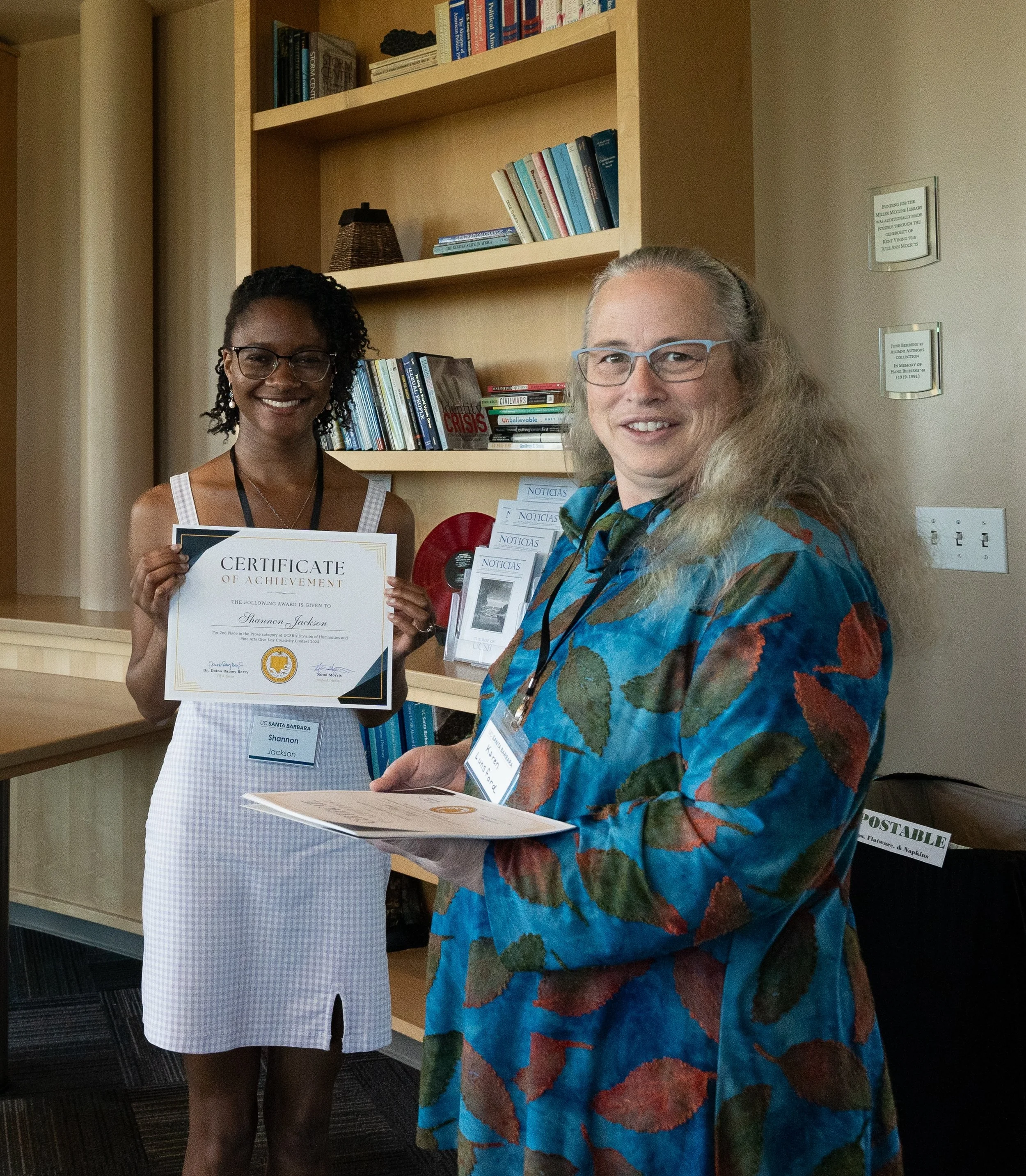  Prose award recipient Shannon Jackson, left,  displays her certificate with Writing Program director Karen Lunsford.    Photo by Jillian Tempesta  