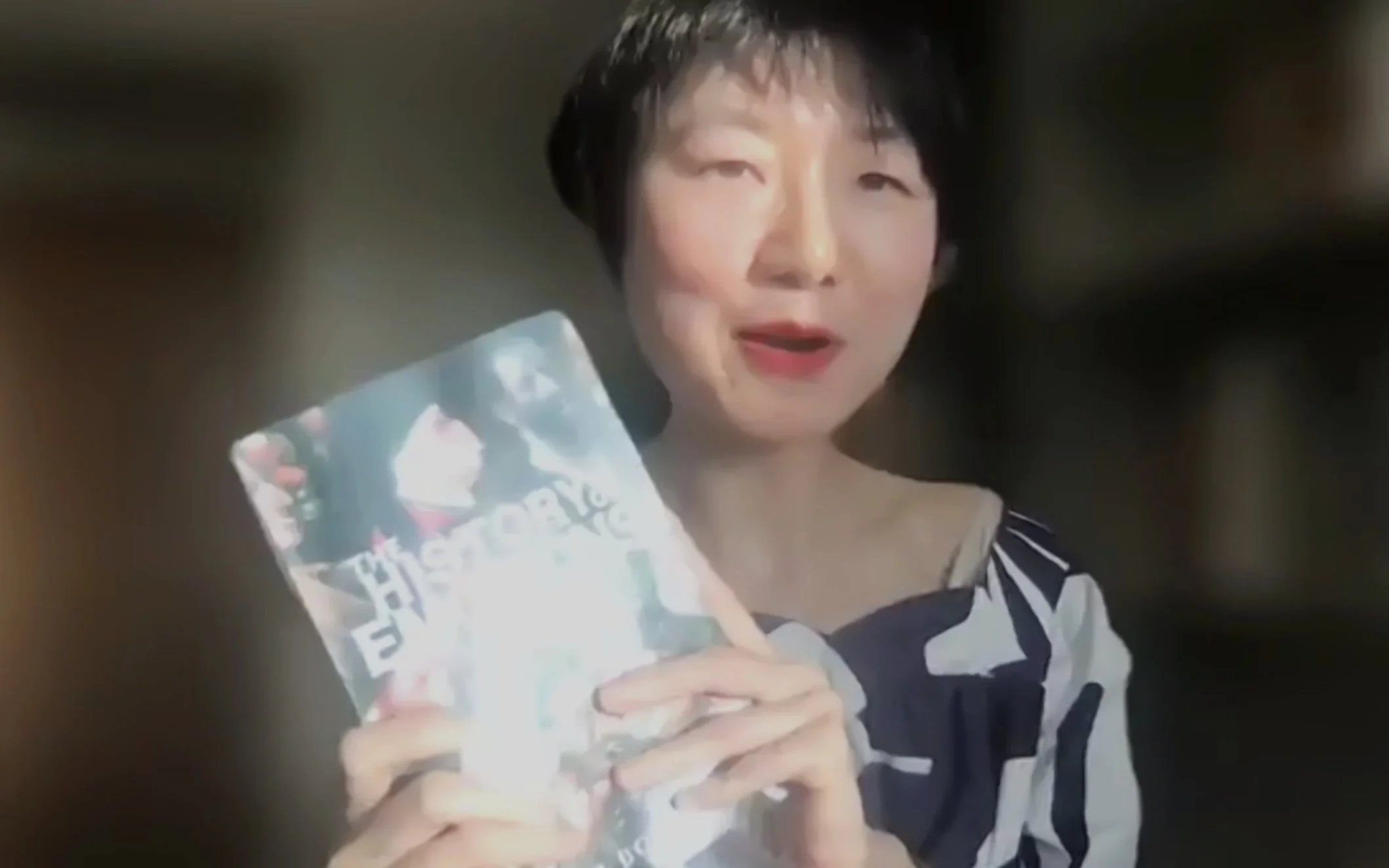  Ya Zuo,  a History professor  at UCSB and convener of the History of Emotion Research Focus Group, holding Rob Bodicce’s book  The History of Emotions.  