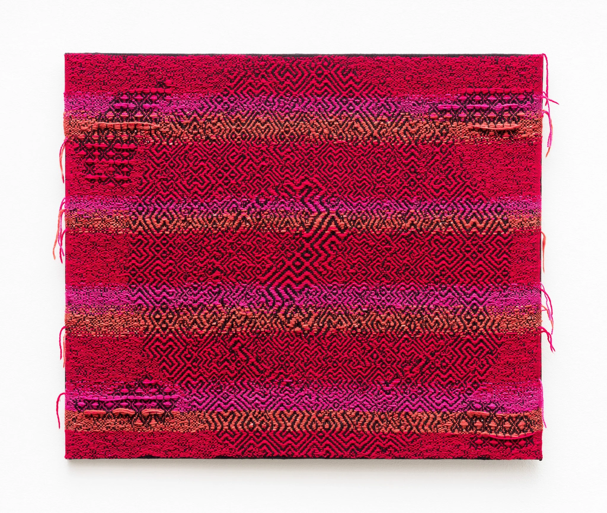  ‘Spiral Arm Red,’ a textile utilizing a four-pointed star pattern motif to produce glitches when weaving an image of the Milky Way. Created by Sarah Rosalena Brady. 
