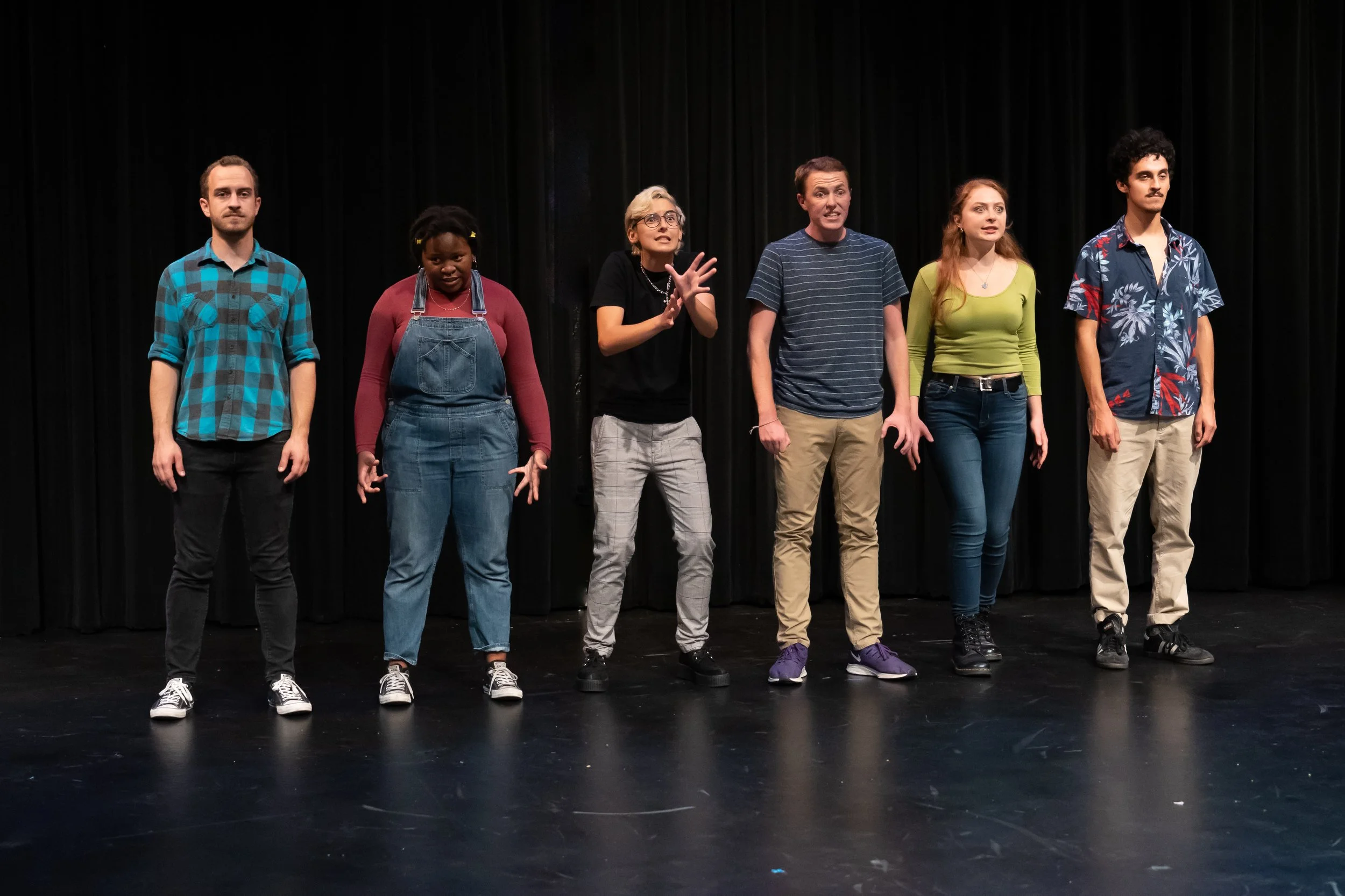  Six of the eight ensemble members acting out 35 plays in 70 minutes for UCSB’s production of “Too Much Light Makes the Baby Go Blind.” Photo by Stephen Sherrill. 