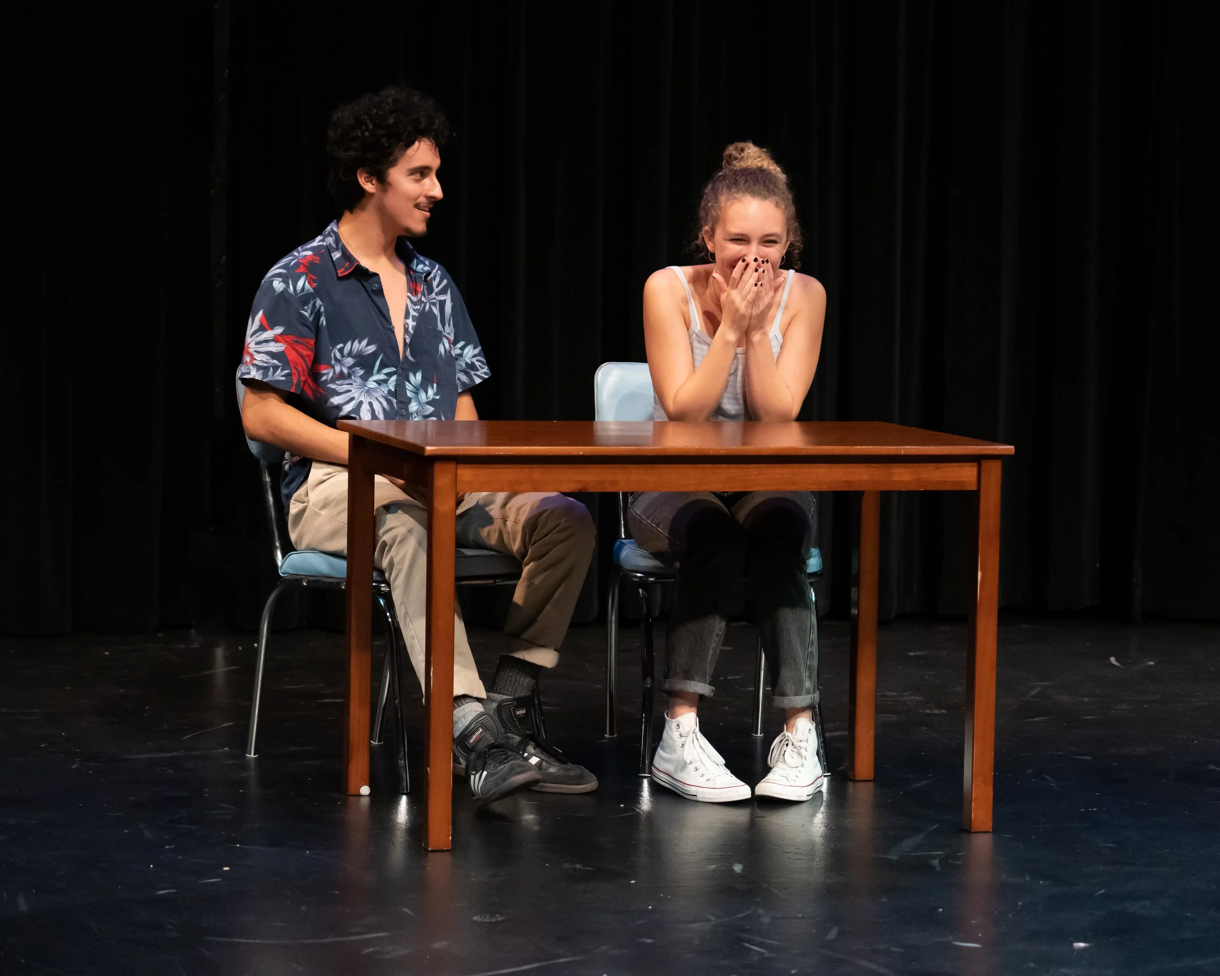  Angel Villalobos (left) and Hailey Turner (right) during one of the 35 plays performed as part of UCSB’s production of “Too Much Light Makes the Baby Go Blind.” Photo by Stephen Sherrill.  