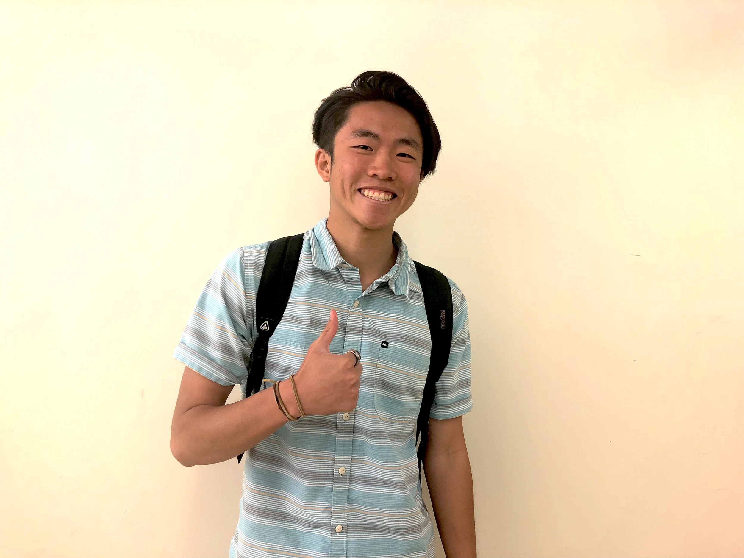  Andrew Nguyen gives a thumbs up to the camera. (Photo by Sasha Nasir) 