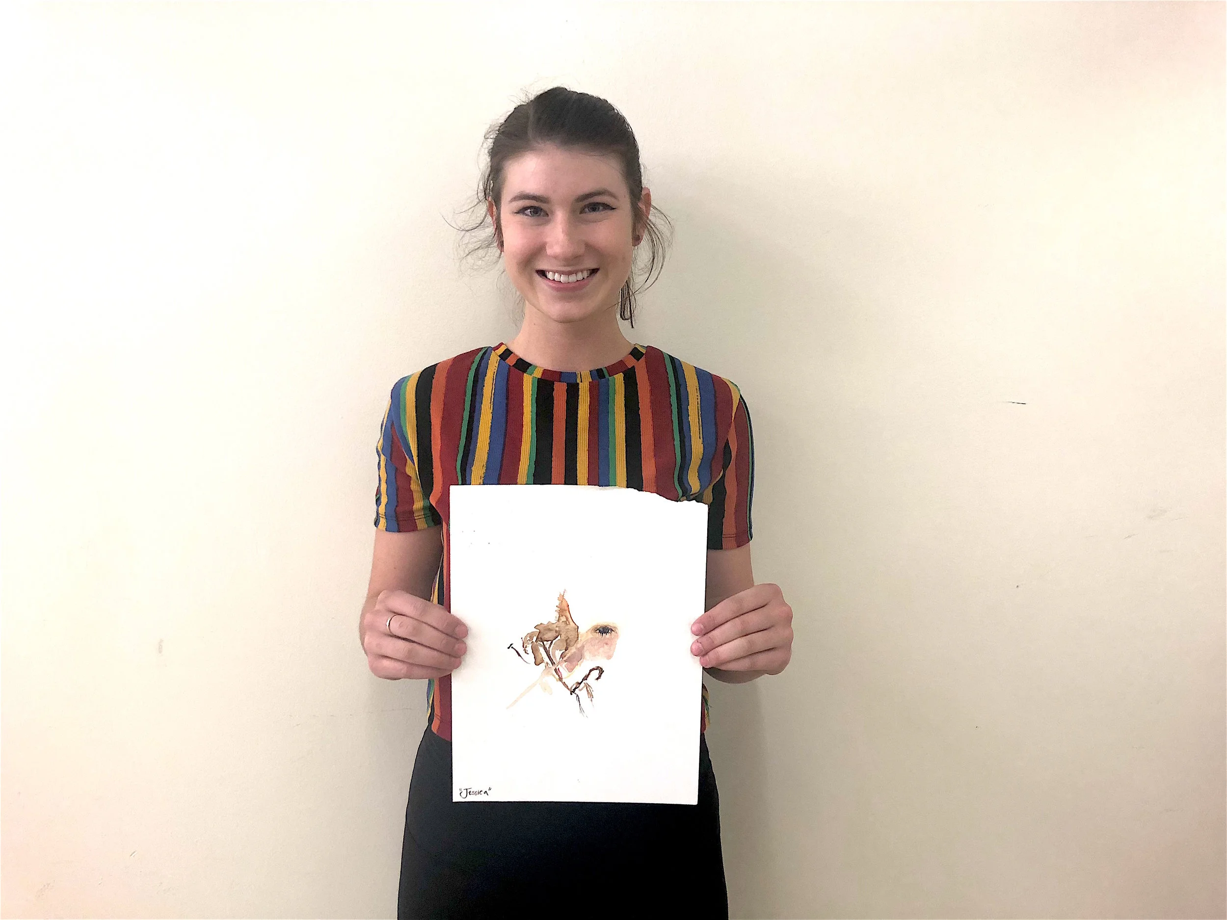  Jessica O'Brien holds her winning piece for a photo. (Photo by Sasha Nasir) 