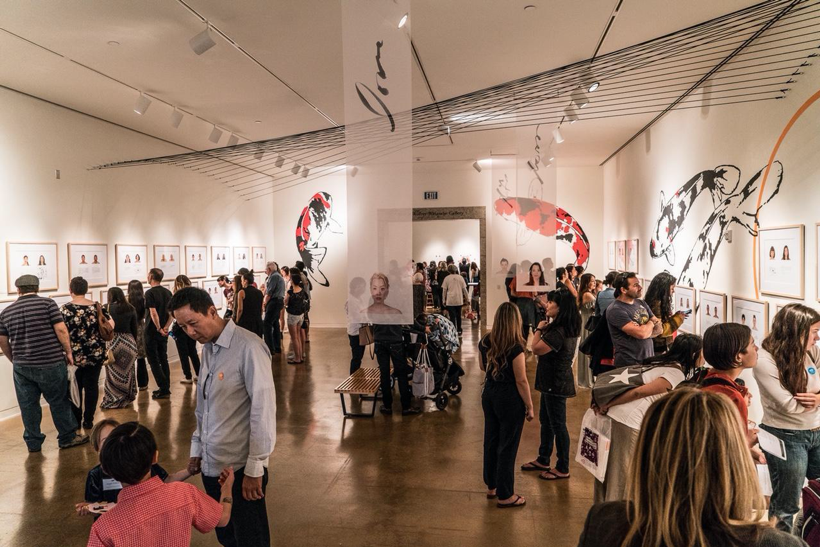  Opening day of Kip Fulbeck’s exhibit, “hapa.me - 15 years of the hapa project,” at the Japanese American National Museum in Los Angeles, in April 2018. Photo by Kip Fulbeck. 