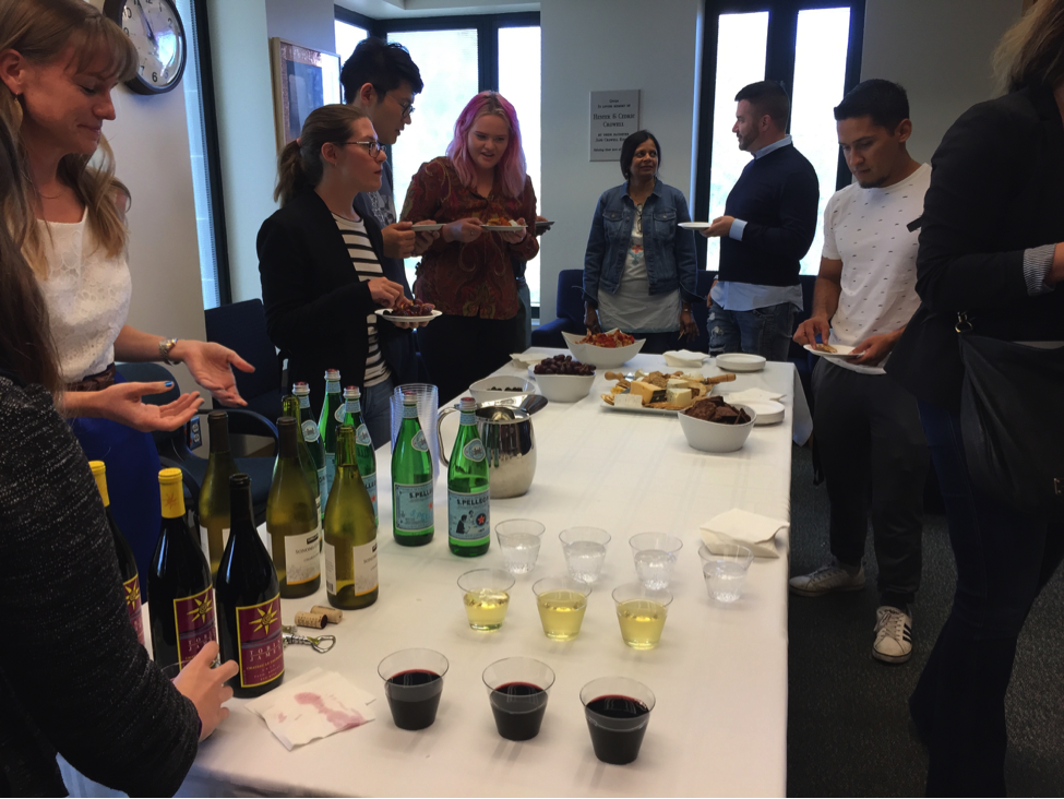  UC Santa Barbara students and faculty gather and discuss the Iraq Front and Center Symposium at a reception following the first panel discussion. 
