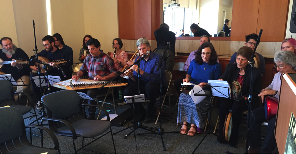  UCSB Middle East Ensemble performs in the McCune Conference during the May 10th reception for Iraq Front and Center. In the center, playing a wind instrument, is founder and director of the ensemble, Scott Marcus. 