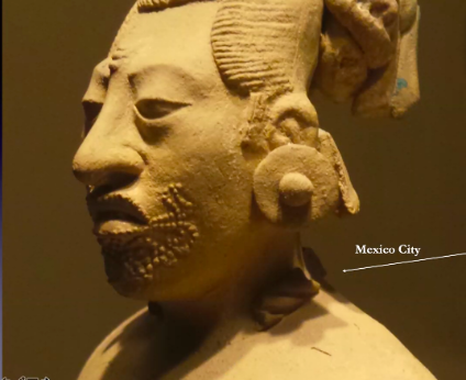  This sculpture shows a dotted imprint around the mouth, suggesting that this female  depicted by the figurine would have been a singer. 