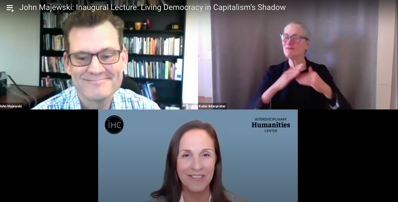  John Majewski, Professor of History, upper left, Susan Derwin, Director of the Interdisciplinary Humanities Center, center, and Katie Voice, ASL interpreter, together on Zoom for the inaugural lecture of the IHC’s Living Democracy series. 