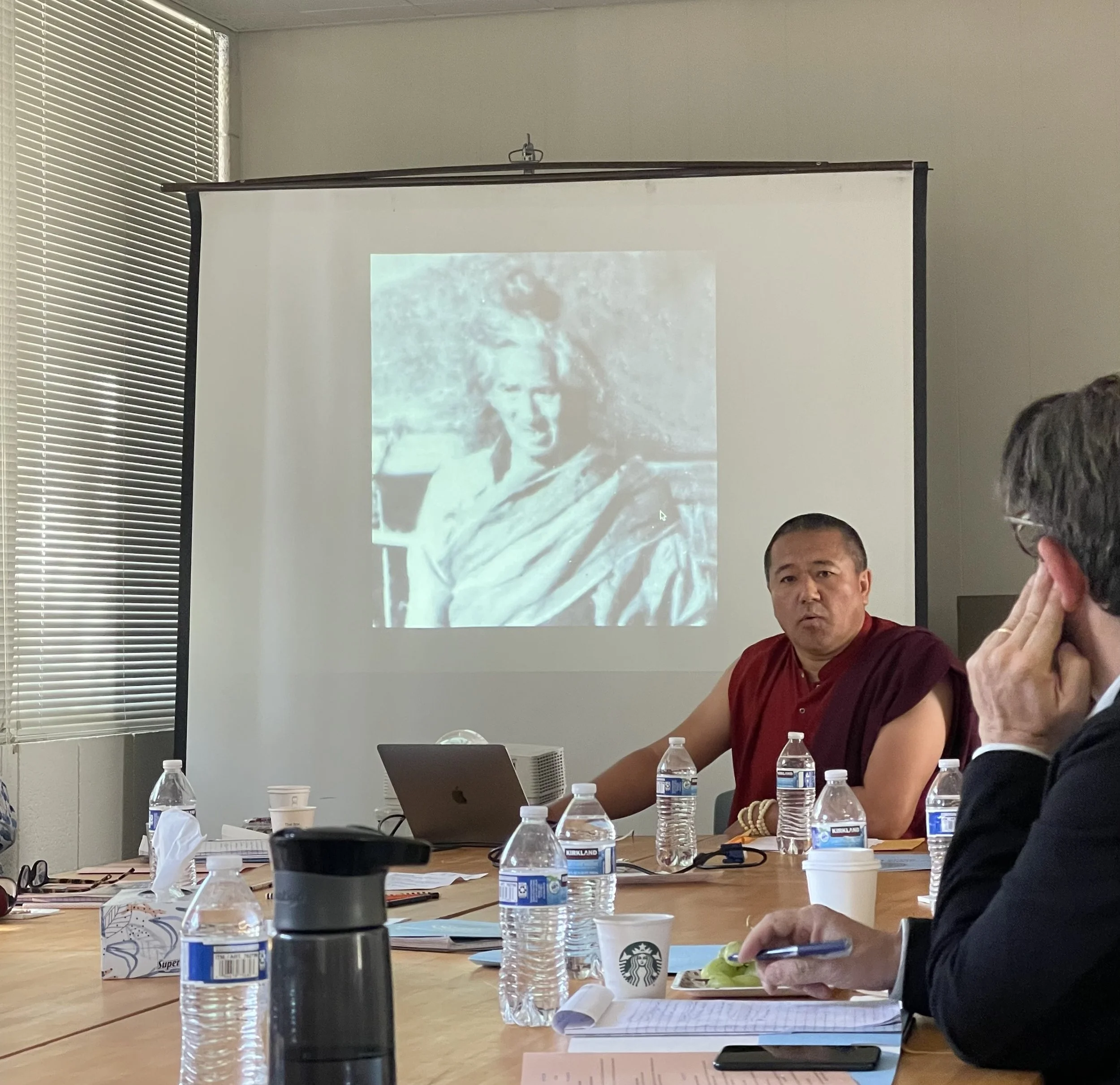   Tulku Orgyen Rinpoche, shows an image of his past life, during a workshop on Buddhism recently held by UCSB’s Religious Studies department. 