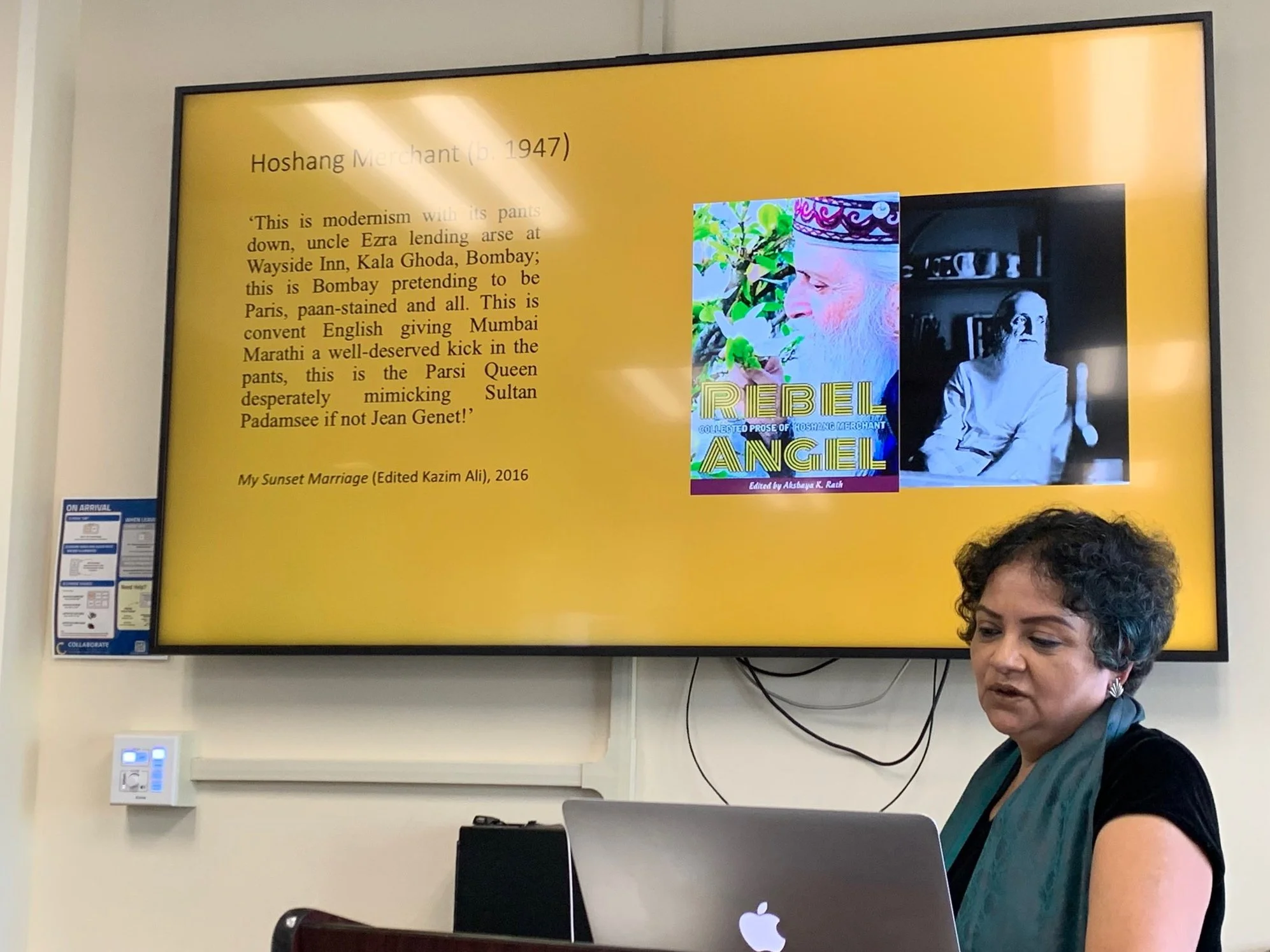  Brinda Bose, an English professor visiting UCSB from New Delhi, India,  presents a quote from famed avant-garde poet Hoshang Merchant’s 2016 novel  My Sunset Marriage . 