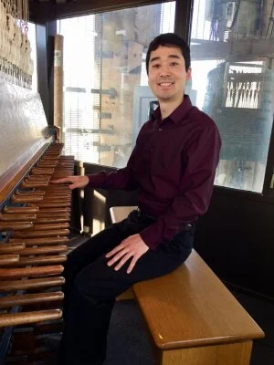   Music Dept. lecturer Wesley Arai pictured at the Storke Tower carillon at UC Santa Barbara.  